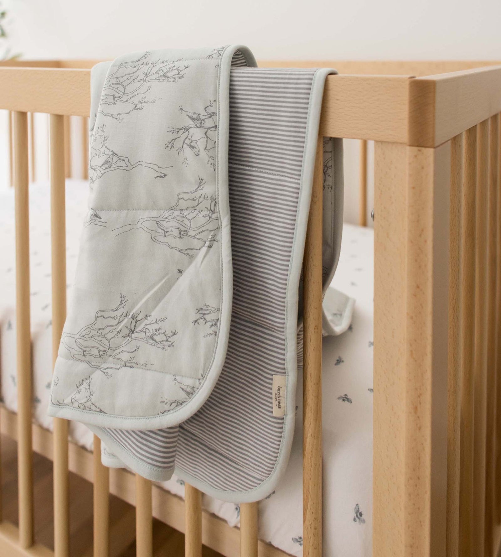 Swaying Branches Organic Cotton Reversible Baby Blanket - Ice Flow
